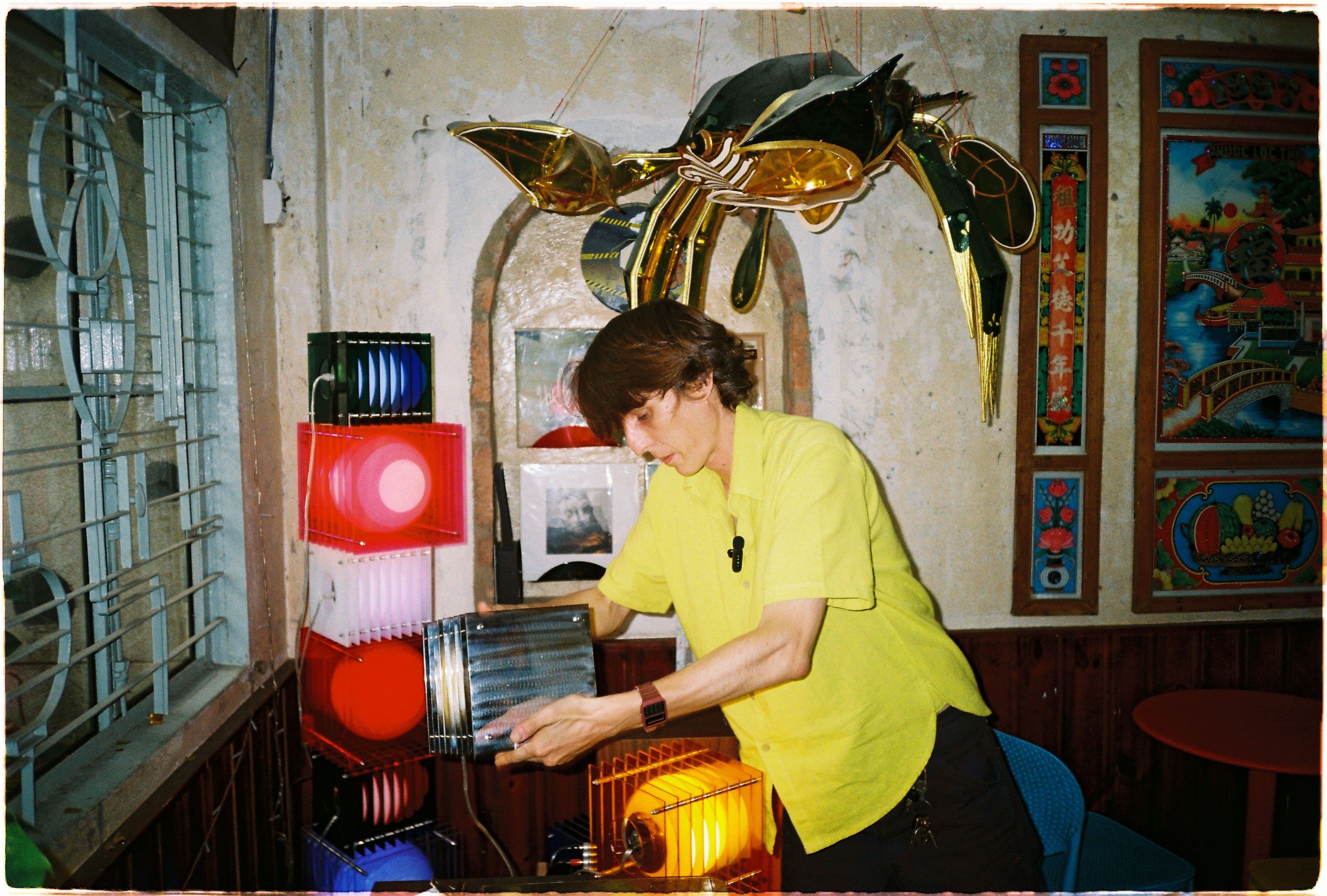 thomas holding his light in neo coffee 