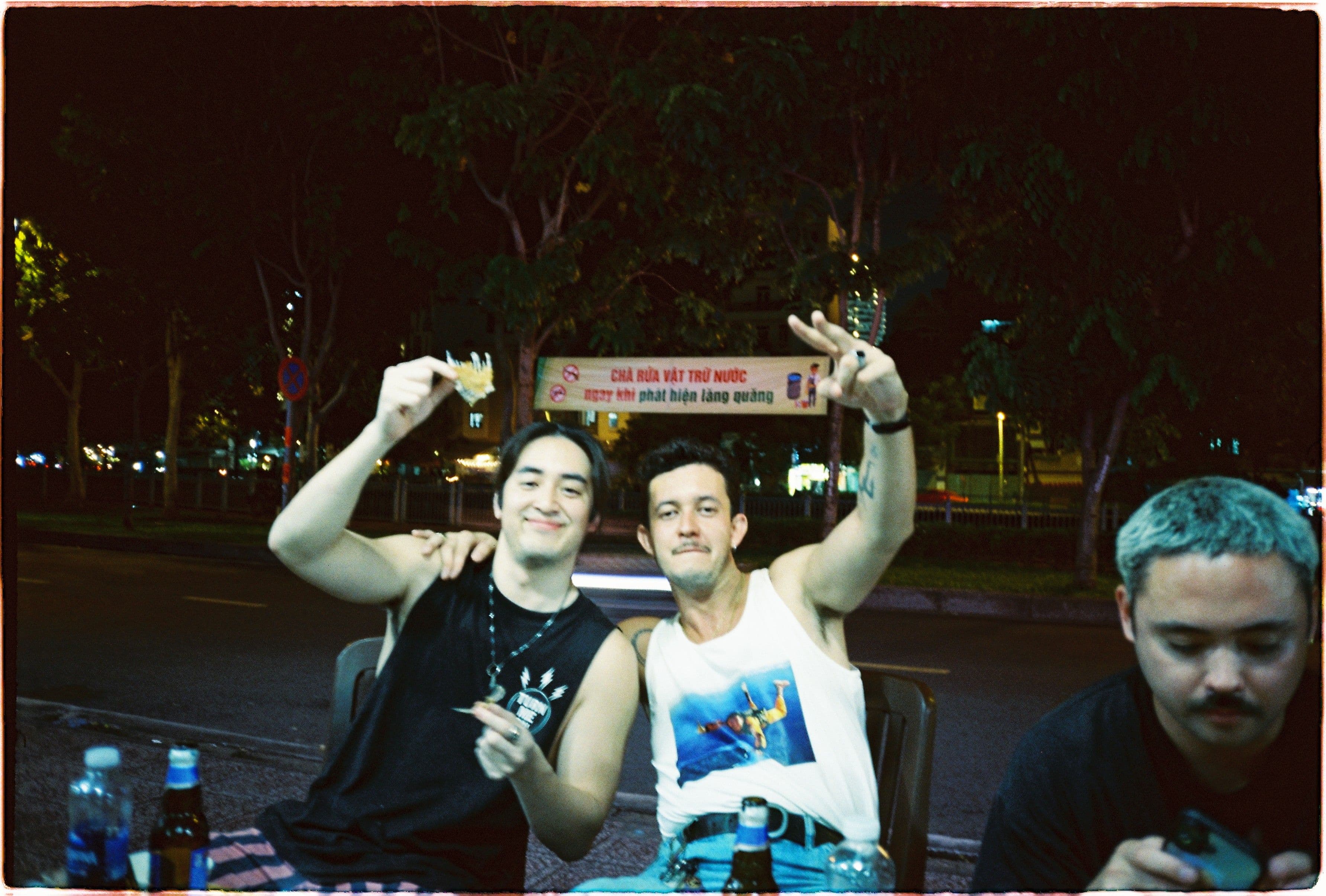boys on the street eating food