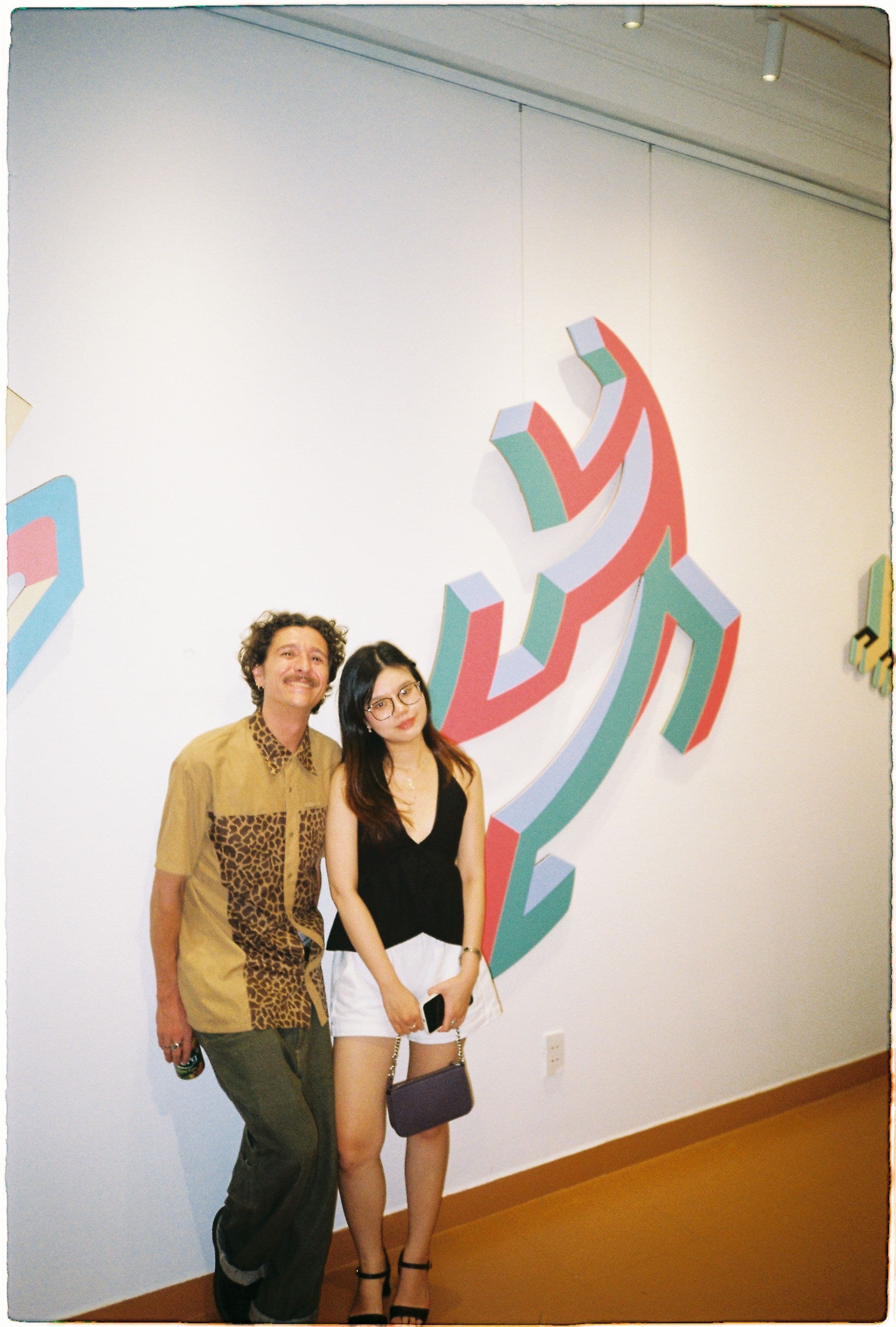 dano and guest at art show 