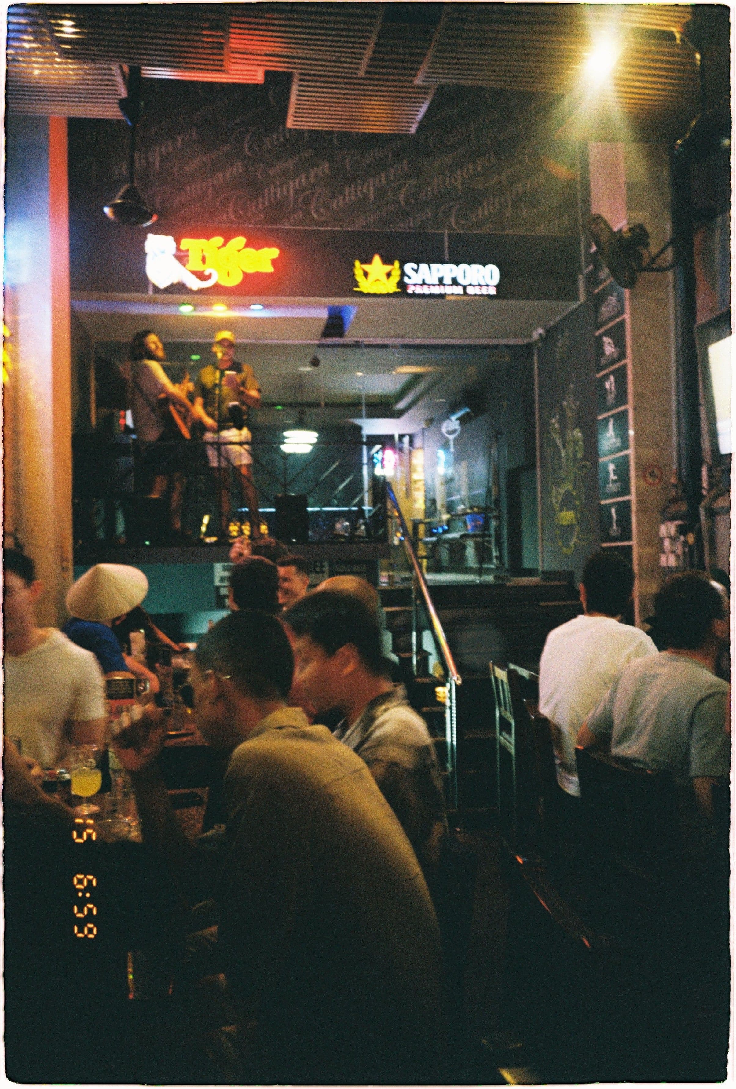 people singing at bar 