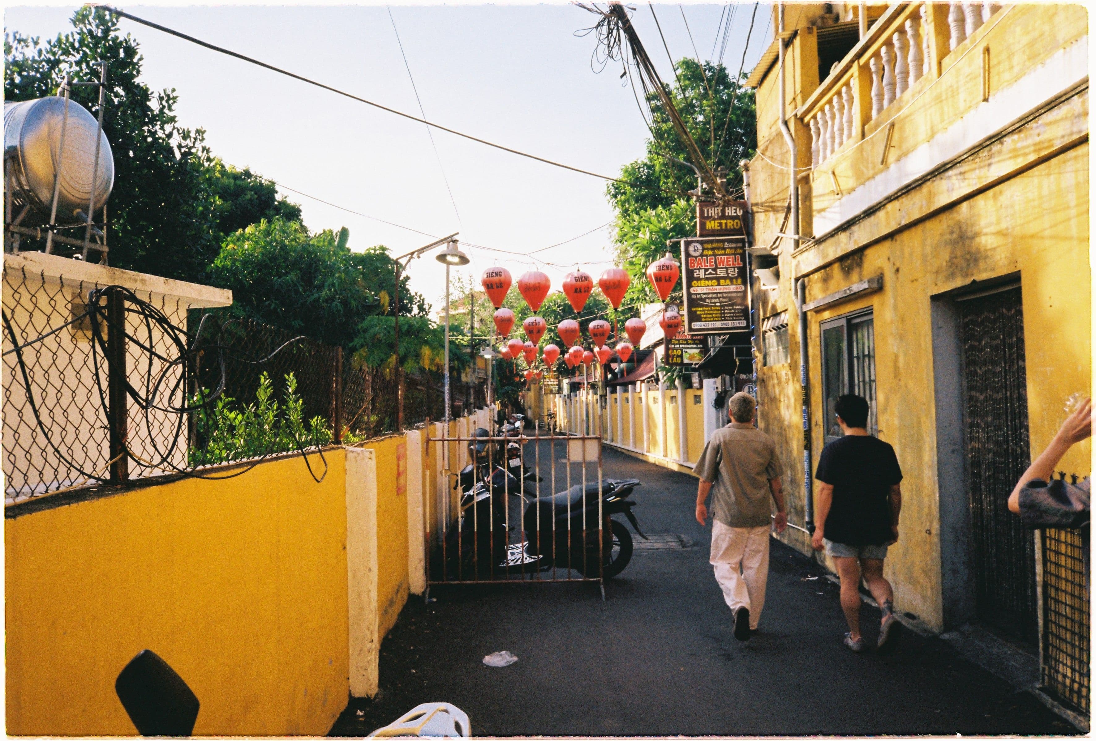 tourists walking in hoi an