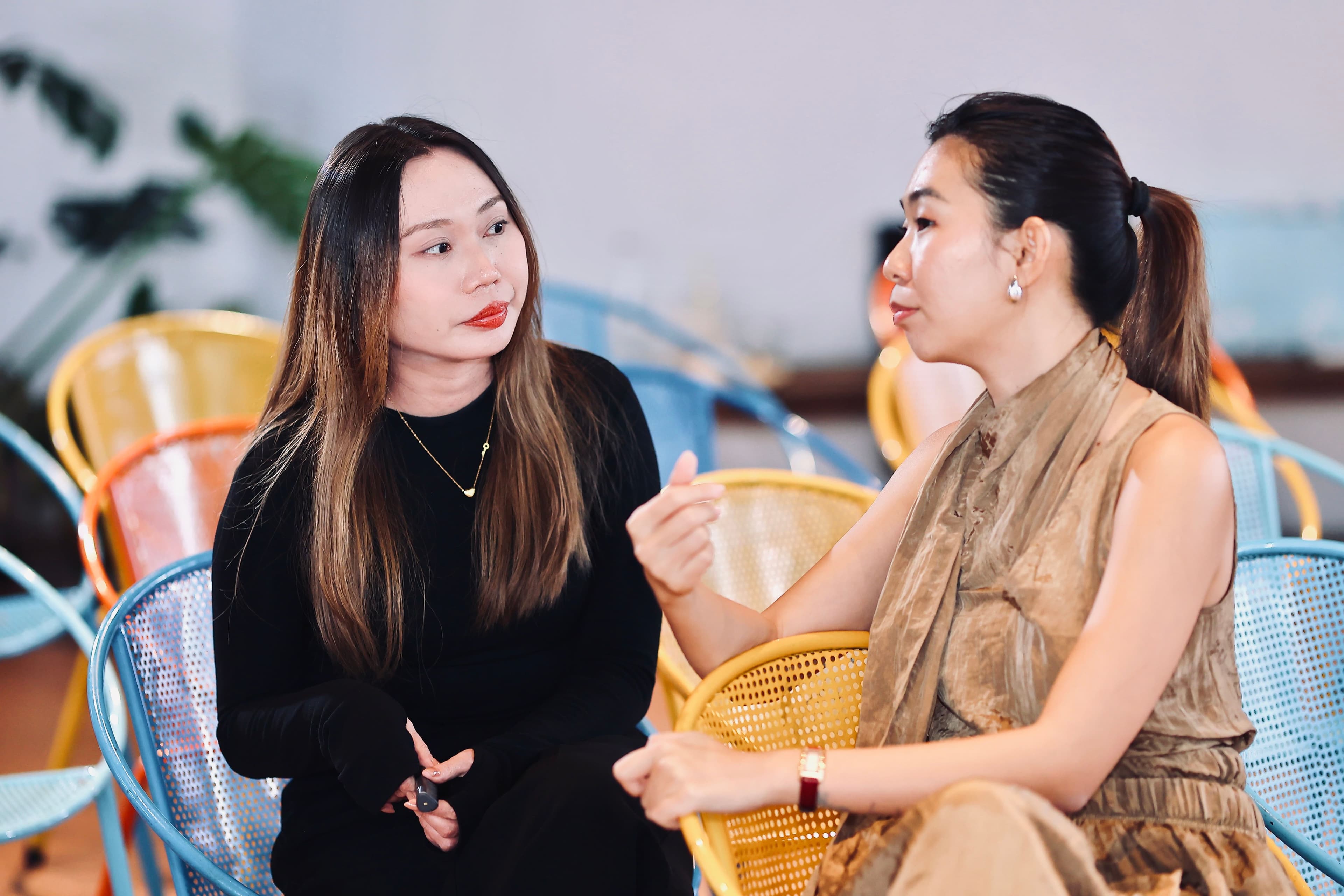 two people talking together 