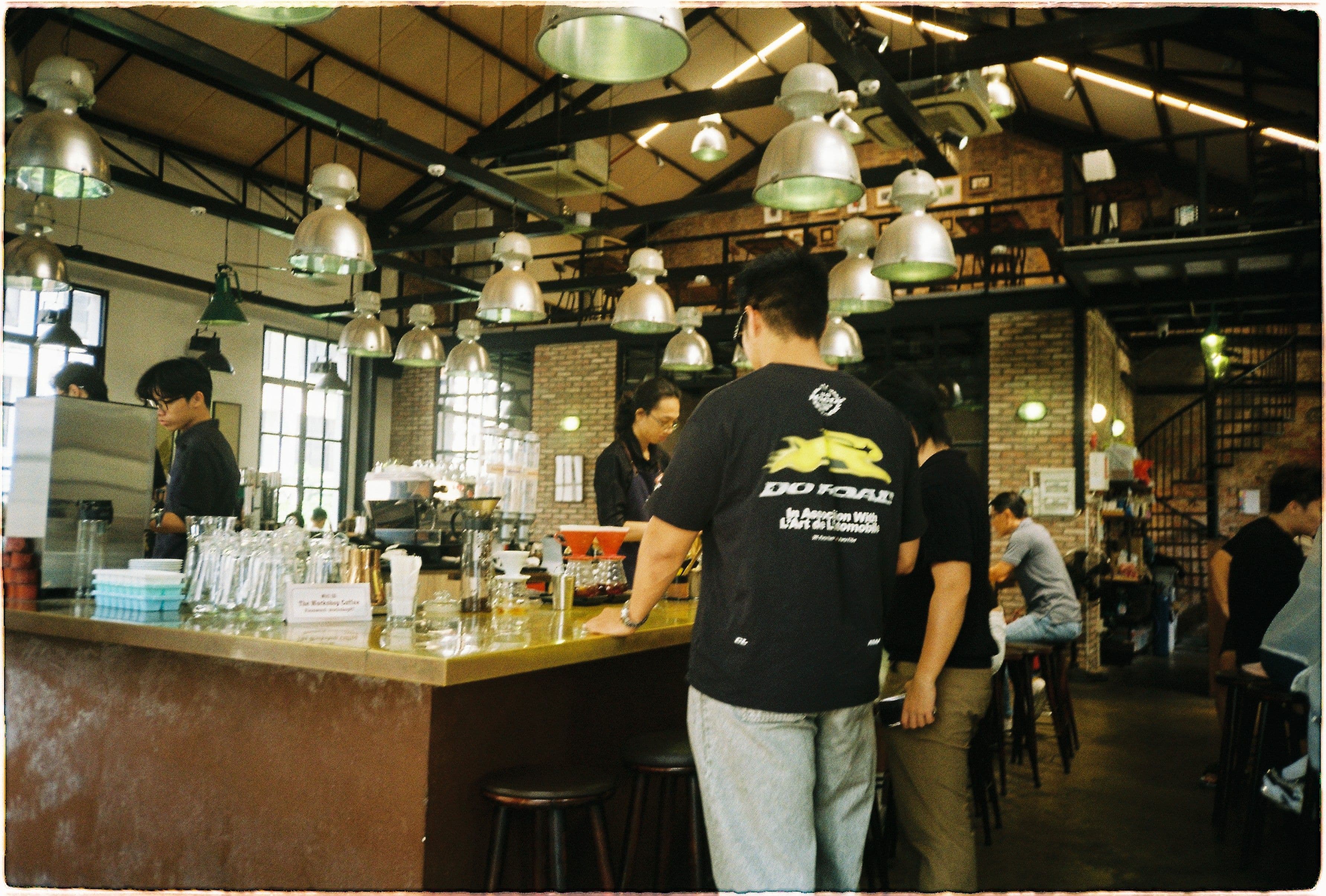 boys taking selfies workshop coffee