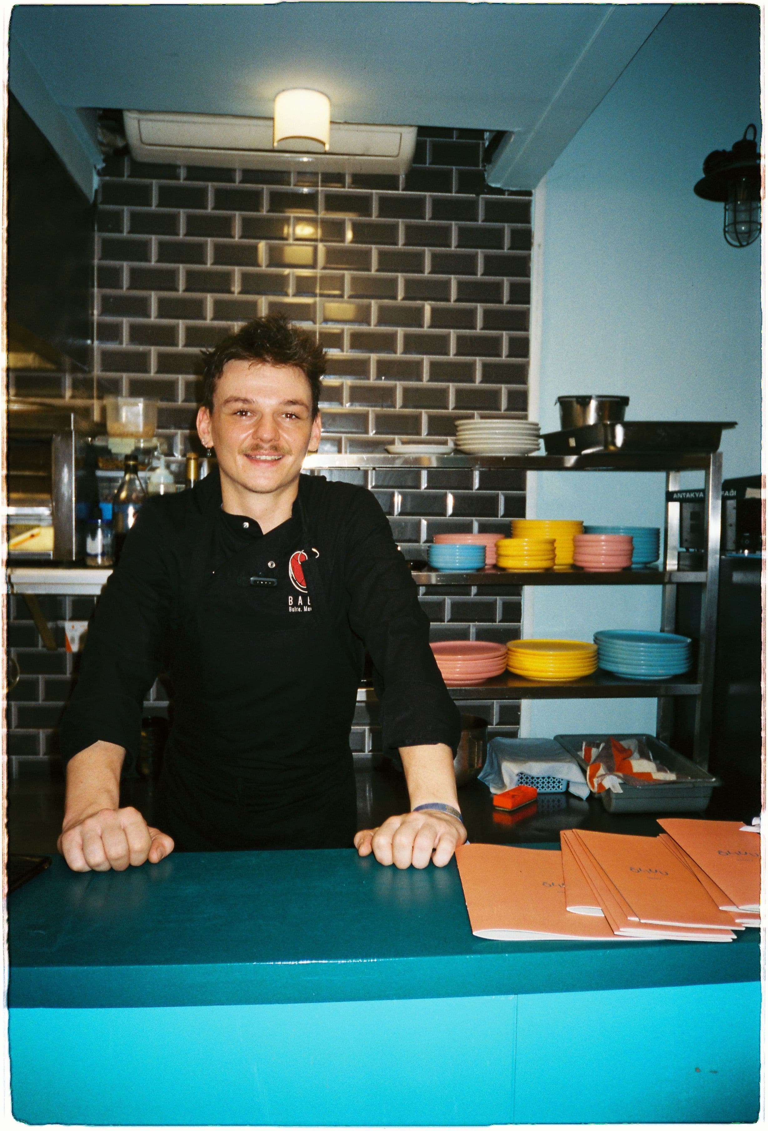 louis standing in the kitchen 